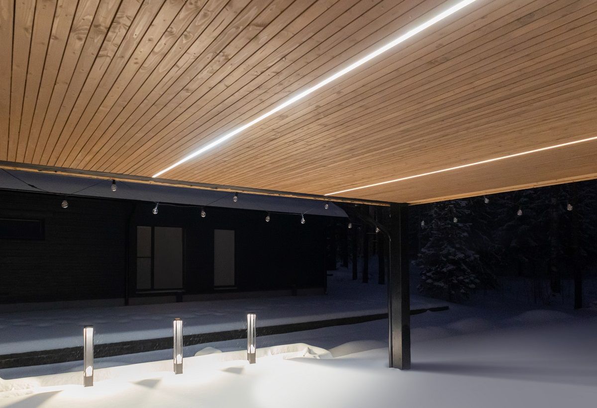 The desired amount of light on the terrace can be achieved with dimmable and colour temperature adjustable LED strip lighting, installed between the roof ledges